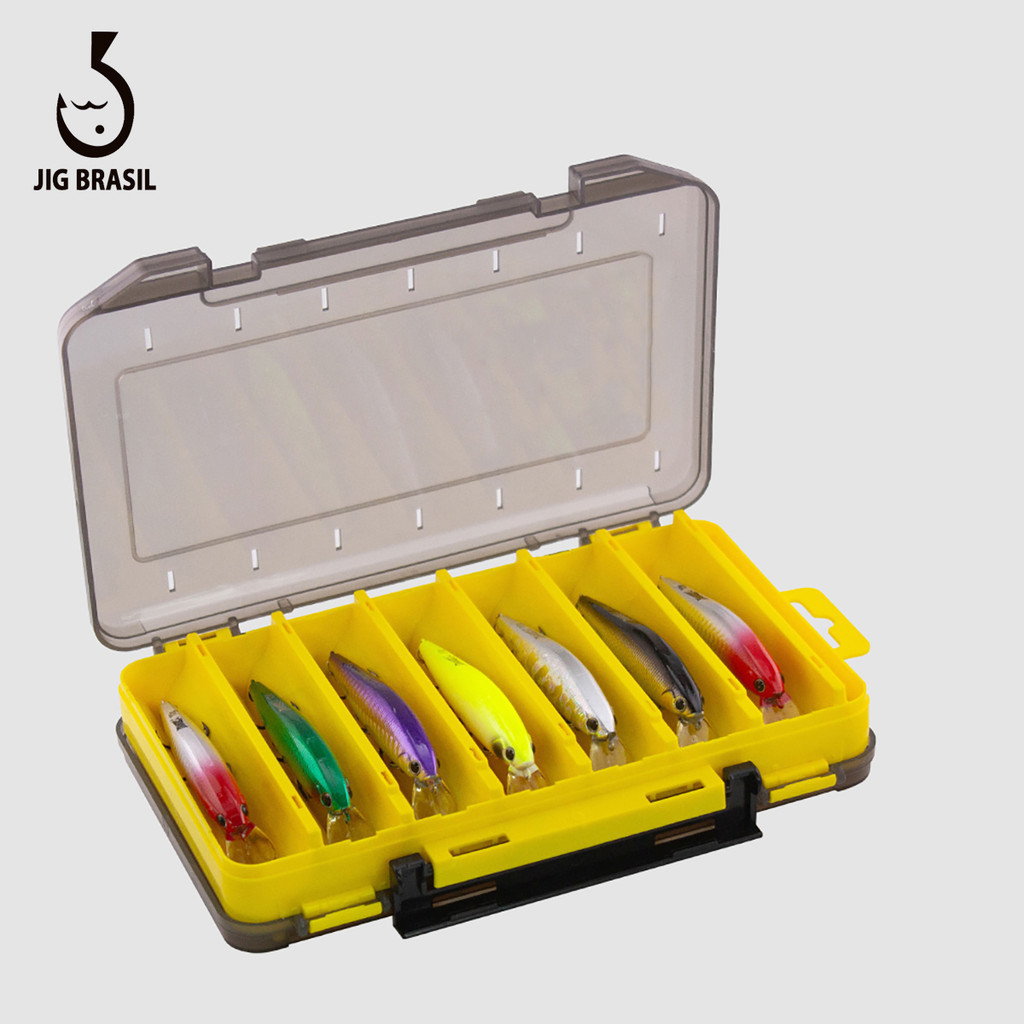 Uma caixa de pesca de duas faces para o armazenamento portátil de anzóis, iscas e outros acessórios de pesca.